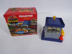 MASK - Kenner - Collector. A boxed Mask 'Collector' from 1987.
