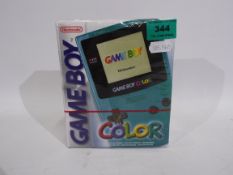Nintendo Game Boy - a Nintendo Game Boy Color,