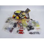 Dinky, Corgi, Britains, Others - Two small boxes of accessories and items, such as spare tyres,