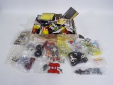 Dinky, Corgi, Britains, Others - Two small boxes of accessories and items, such as spare tyres,