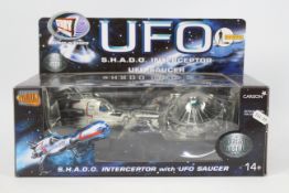 Product Enterprise - A boxed Product Enterprise diecast UFO SHADO Interceptor with UFO Saucer.