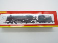Hornby - an OO gauge Super Detail model Britannia 7MT class 4-6-2 locomotive and tender,