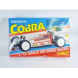 Mardave, Tamiya - A boxed 1/10 scale Mardave Cobra Off Road R/C racer car.