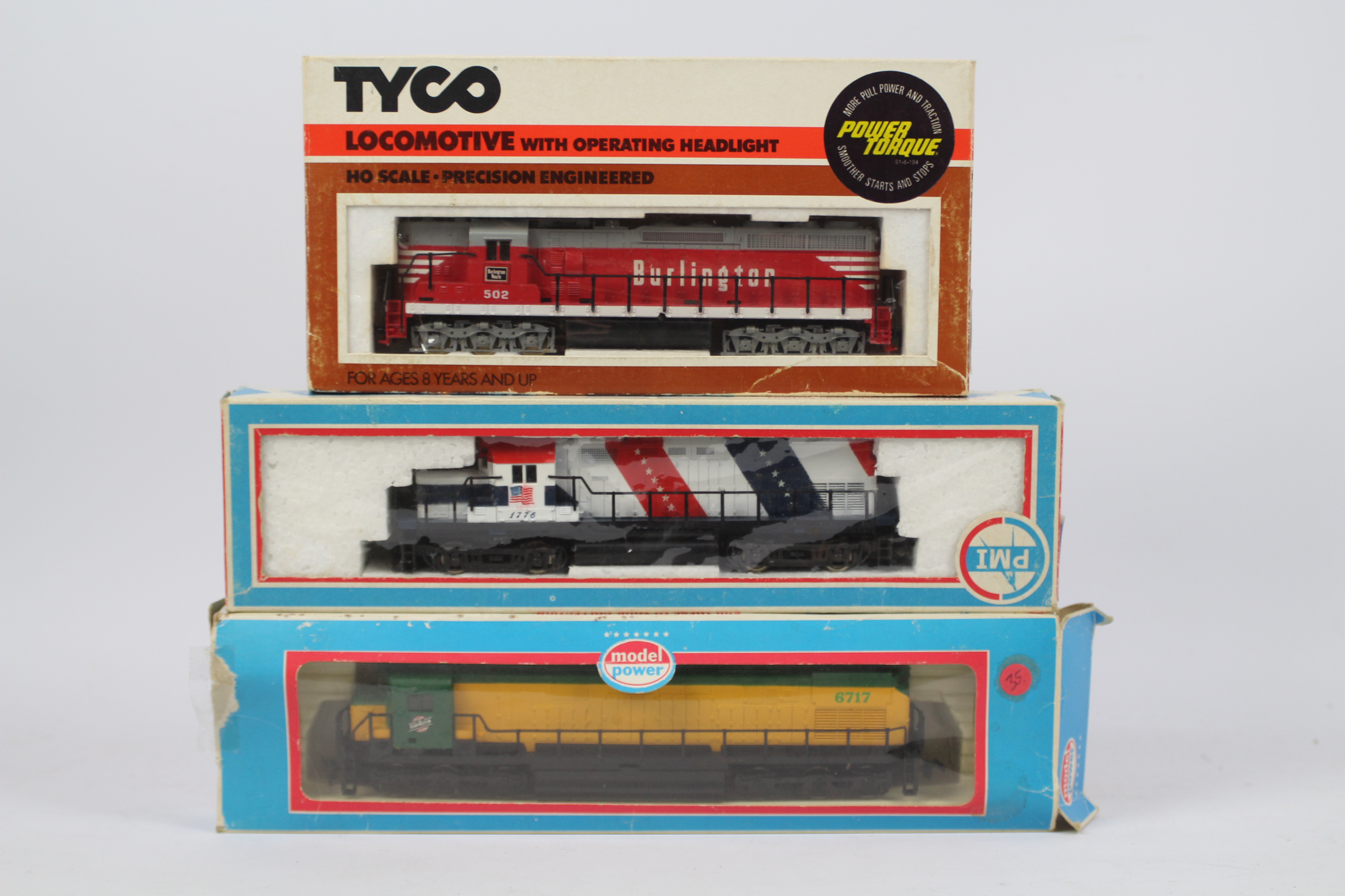 Tyco, PMI - Three boxed HO gauge American locomotives.