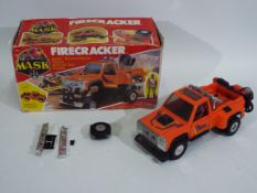 MASK - Kenner - Firecracker. A boxed Mask 'Firecracker' from 1987.