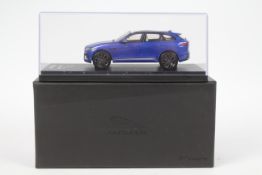 TSM Model - A boxed TSM Model #150EM60 1:43 scale diecast Jaguar F-Pace in Caesium Blue.