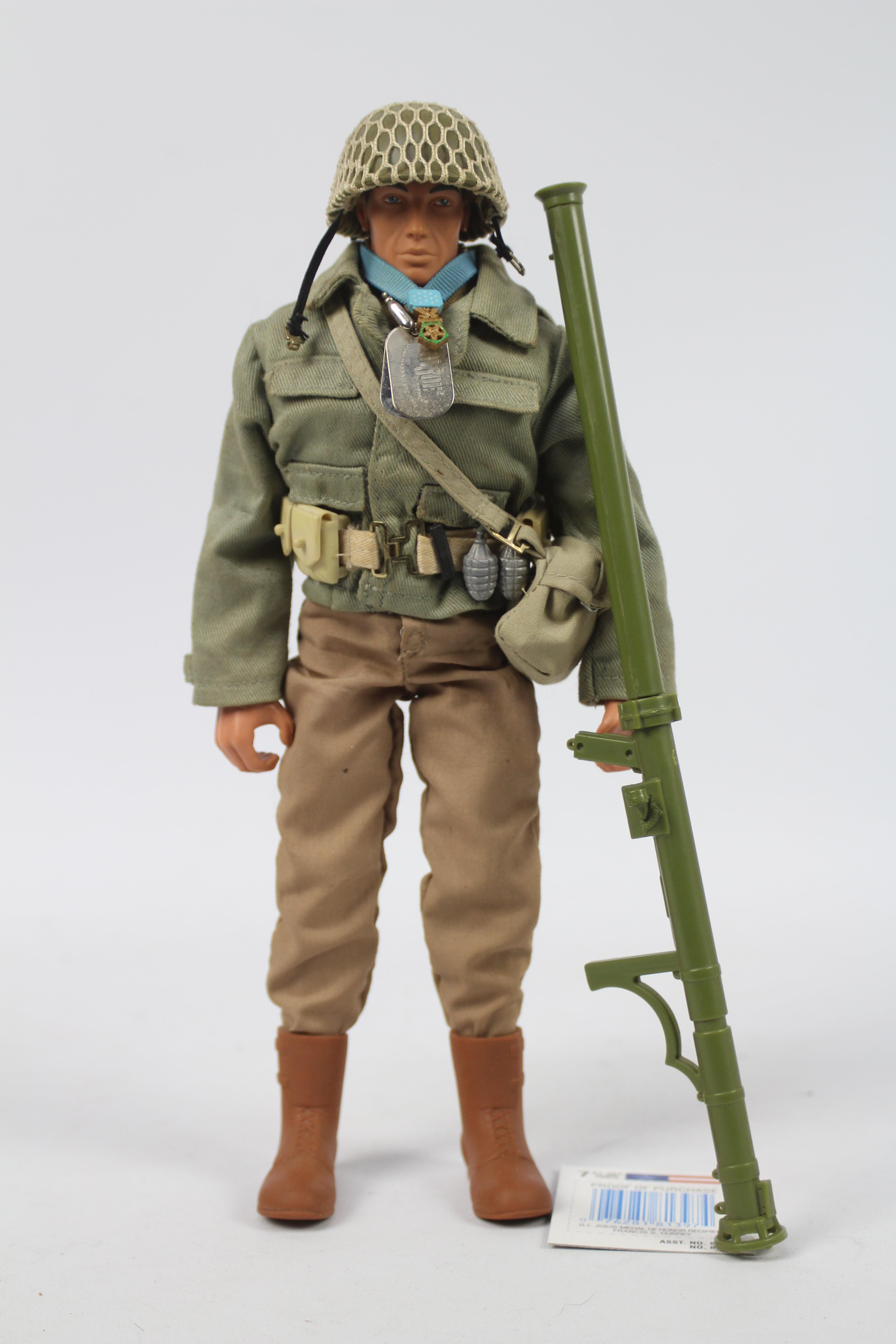 GI Joe, Hasbro - An unboxed G.I. Joe Francis S. Currey Medal of Honor 12" Action Figure.