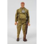 Hasbro, GI Joe - An unboxed Hasbro 'Men of Action' 12" action figure,