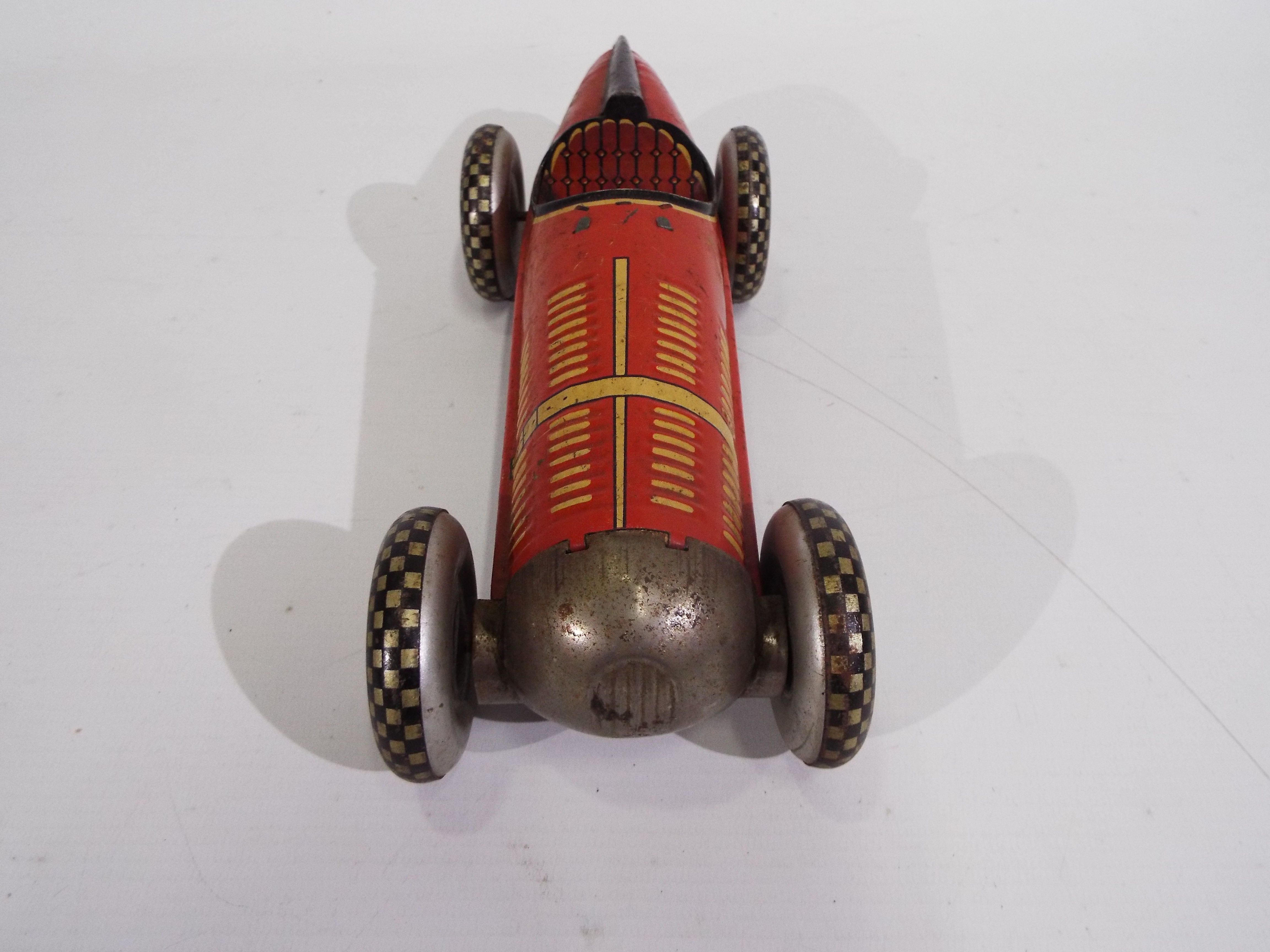 Marx - A clockwork pressed metal Marx Super Racer No. 410 in red with black trim. - Image 4 of 6