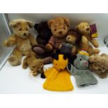 A sleuth of six Bears and three dogs to include Sooty and Sweep,