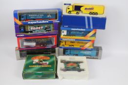 Corgi - Nine boxed diecast model trucks in various scales by Corgi.