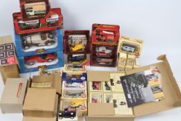 Lledo - Matchbox - Corgi. In excess of 20 boxed, die cast vehicles from varying manufacturers.