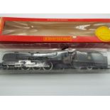 Hornby - an OO gauge model Duchess class 4-6-2 locomotive and tender,