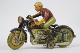 Arnold - A rare Arnold Mac 700 clockwork tinplate Motorcycle made in the US Zone Germany measuring