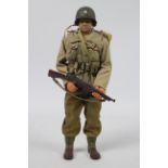 Hasbro, GI Joe - An unboxed Hasbro 'Men of Action' 12" action figure, depicting Tom Hanks (Capt.