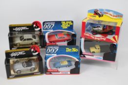 Corgi - A collection of six predominately James Bond themed diecast model vehicles form Corgi.