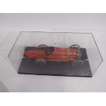 Marx - A clockwork pressed metal Marx Super Racer No. 410 in red with black trim.