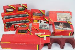 Hornby - A boxed collection of Hornby OO gauge rolling stock, and accessories.