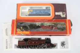 Hornby, Lima - Two boxed locomotives.