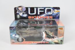 Product Enterprise - A boxed Product Enterprise diecast UFO Skydiver.