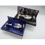 Minichamps - two 1:43 scale models comprising Minichamps Brawn GP BGP 001, J Button,