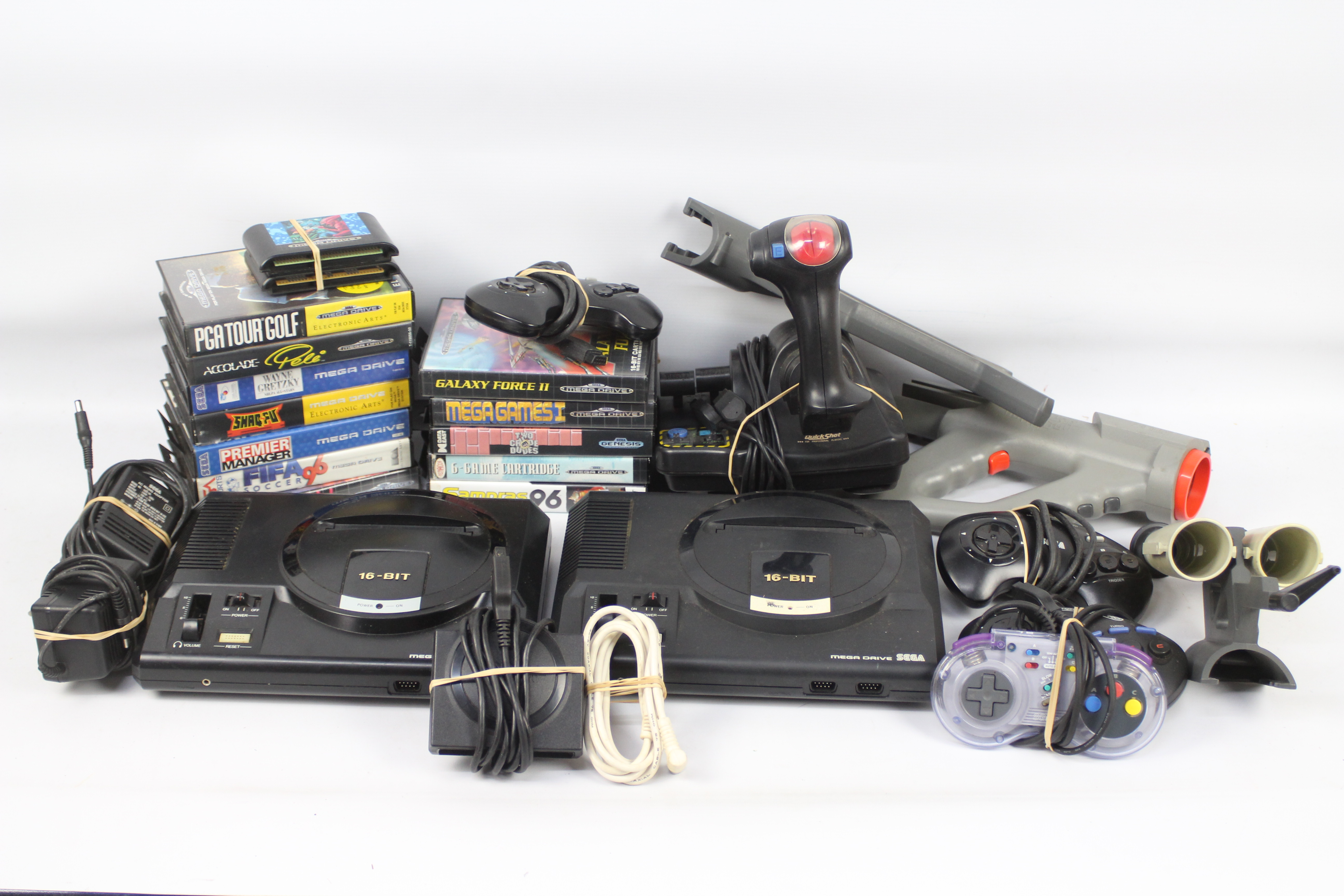 Sega - Mega Drive - A collection of items including 2 x Mega Drive consoles, 12 boxed games,