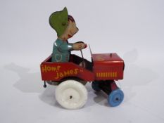 Lawley Toys - A clockwork pressed metal Crazy Jeep car with the less common white and blue wheels.