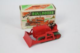 Moko - A rare 1940s Moko Bulldozer in red with brown driver and green rubber tracks which are still
