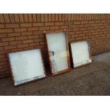 Three wall mounted display cabinets with glass shelves - two measure approximately 90cms (H) x