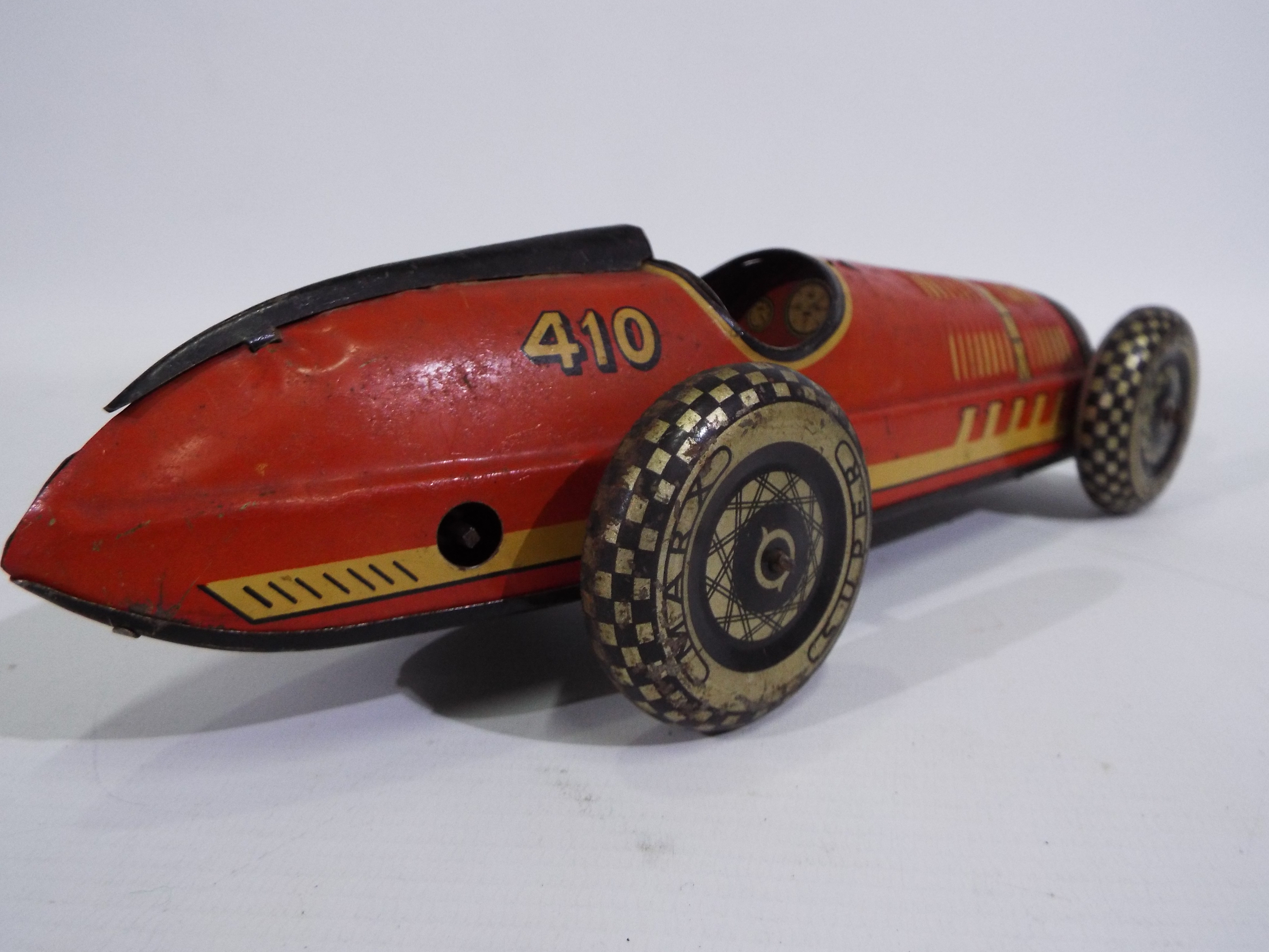 Marx - A clockwork pressed metal Marx Super Racer No. 410 in red with black trim. - Image 5 of 6