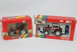 Britains - Two boxed Britains 1:32 scale diecast model tractors.