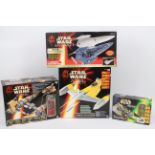 Star Wars, Hasbro, Kenner -Three boxed Star Wars vehicles and a boxed Star Wars game.