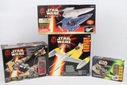 Star Wars, Hasbro, Kenner -Three boxed Star Wars vehicles and a boxed Star Wars game.