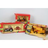 Britains - Three boxed Britains farm vehicles / implements in 1:32 scale.