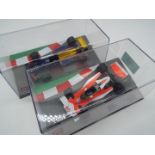 F1 Formula One - two 1:43 scale models comprising Tyrrell # 018, 1989 as driven by Jean Alesi,