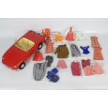 Sindy - Pedigree - A vintage 1970s Sindy MGB Roadster and 17 x bagged items of clothing and a