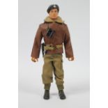 Palitoy Action Man - An unboxed Palitoy brown flock haired Action Man with gripping hands in Tank