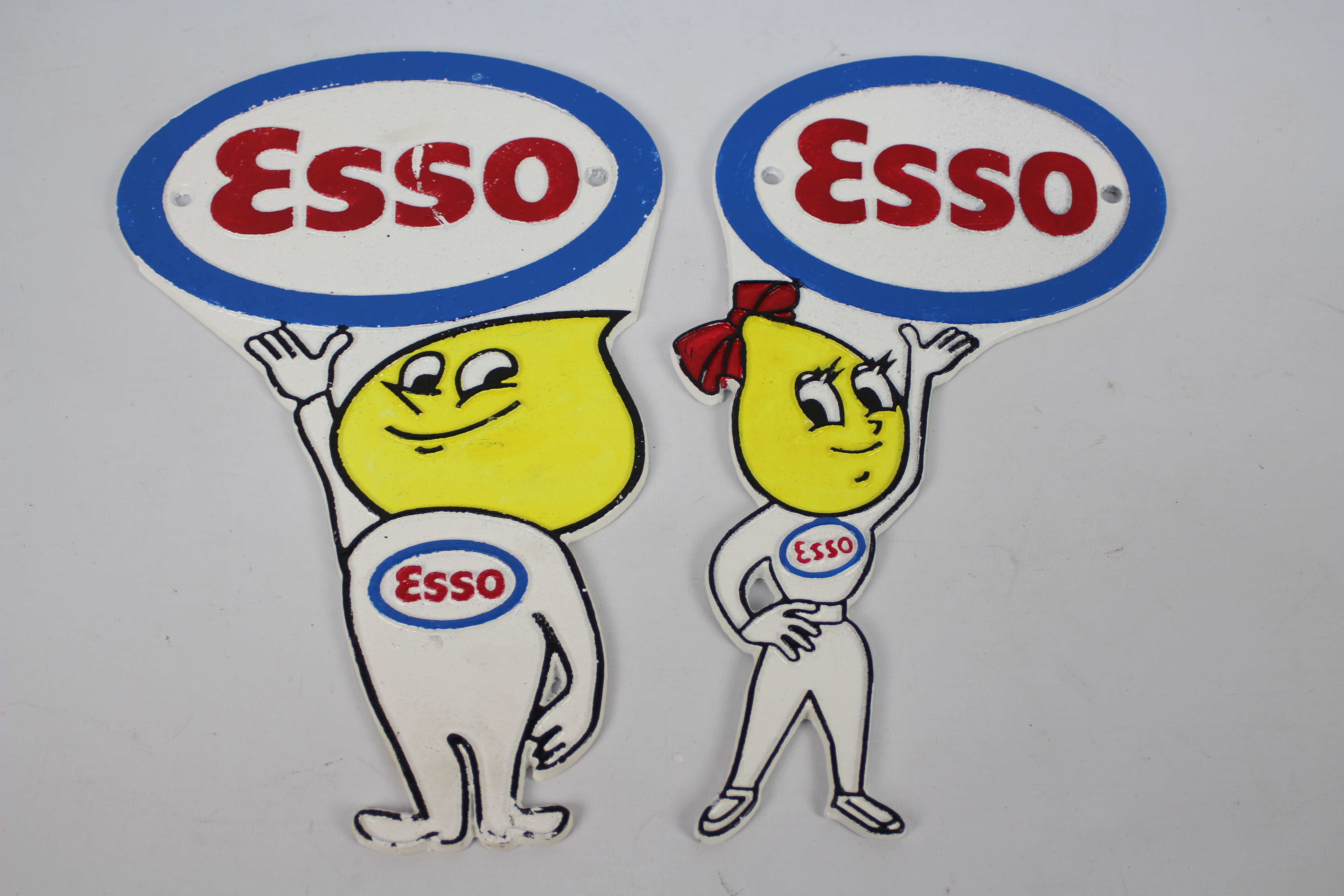 pair of cast iron advertising plaques marked ESSO.