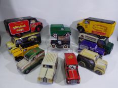 Unknown Maker - A collection of 12 x biscuit tins in the form of vintage style vans including