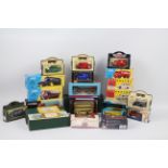 Corgi, Vanguards, Maisto - A boxed group of diecast vehicles in various scales.