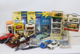 Ertl - Matchbox - EFE - Corgi. Approx 30 boxed and loose die cast model cars / planes.