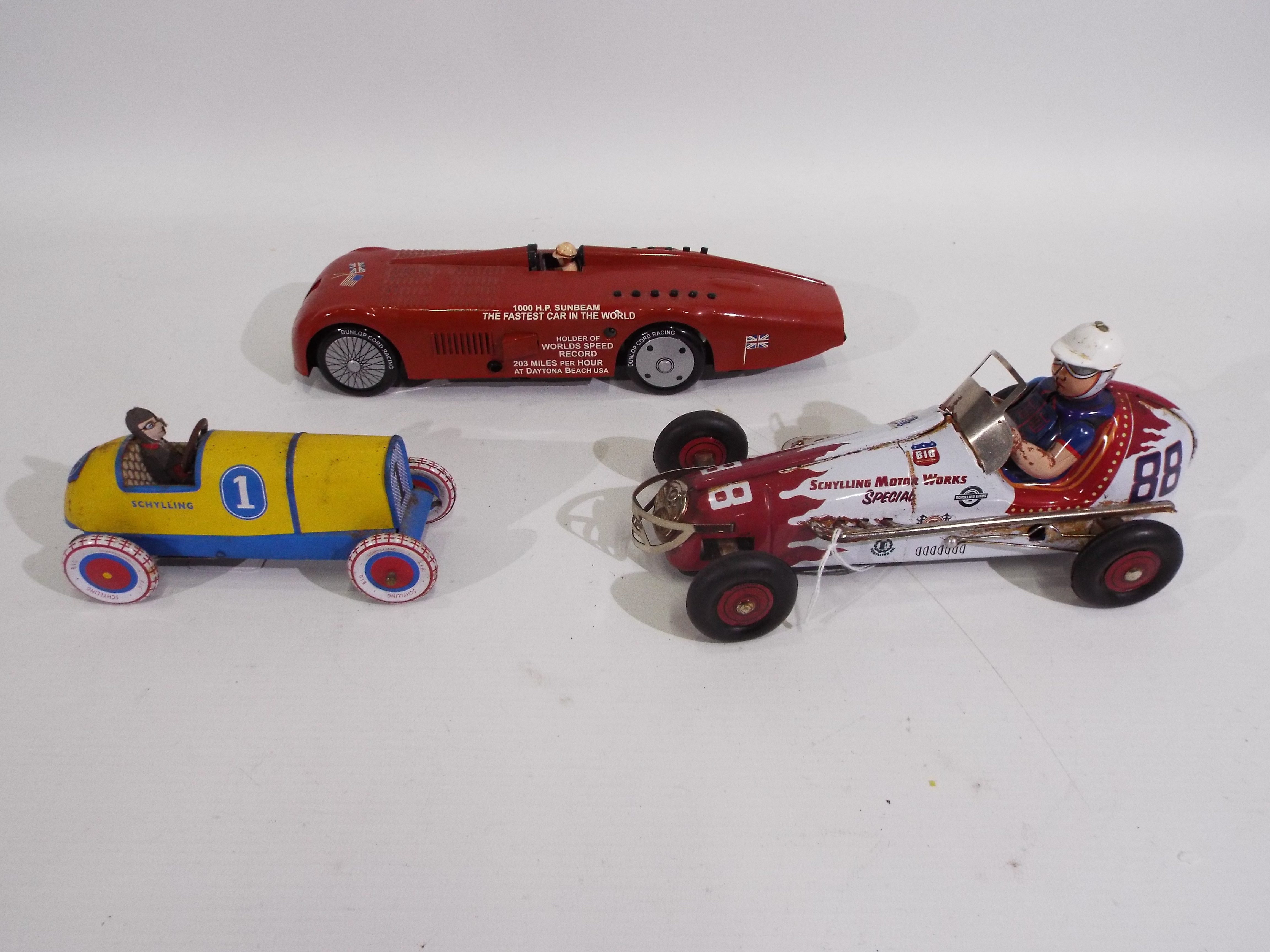 Schylling - 3 x clockwork pressed metal cars, the Sunbeam Speed Record car,