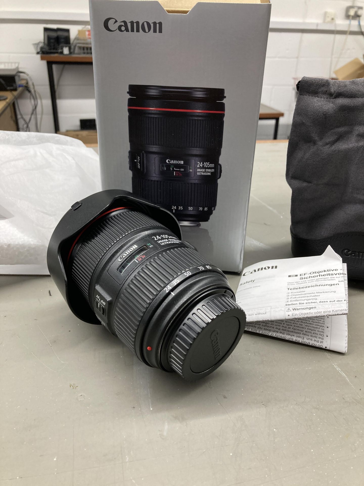 Canon EF 24-105mm f/4L IS II USM lens with LP1219 lens case and WE-83M lens hood