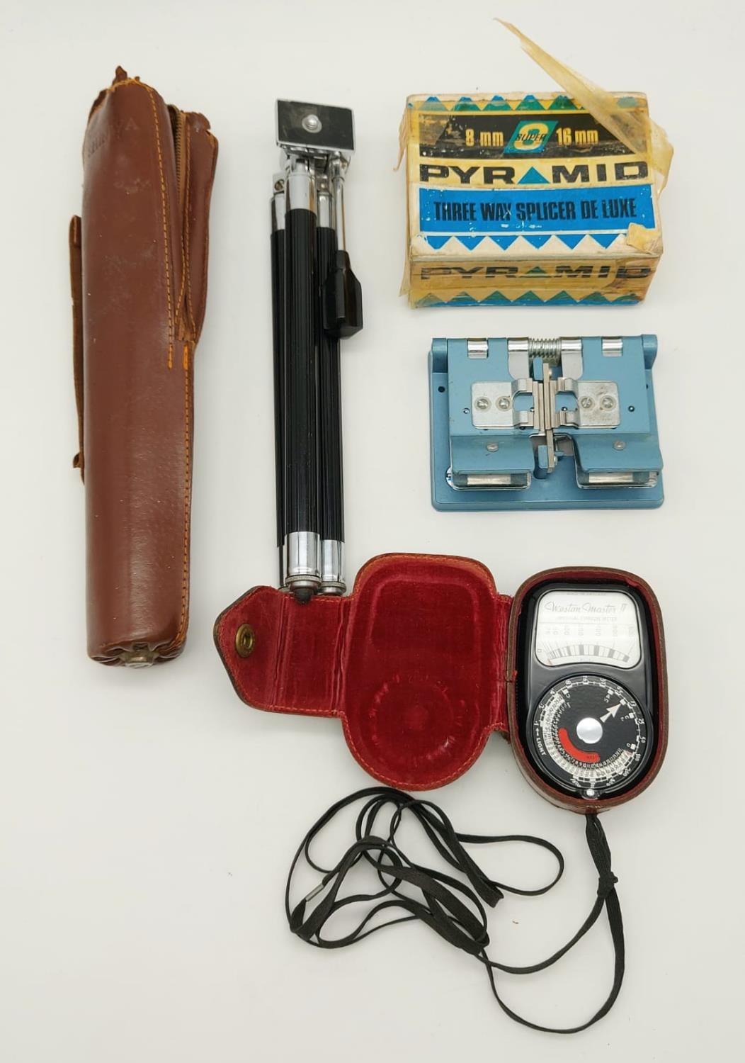 A Vintage Weston Master Light Meter (in leather case), a Pyramid 8-16mm 3 -way film splicer and a