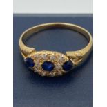 Vintage 18 carat GOLD sapphire and DIAMOND ring.No hallmark but tests as 18 carat. 2.8 grams. Size P
