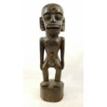 A Vintage, Possibly Antique Hand-Carved African Wooden Fertility Statue. Item is very heavy, so pick