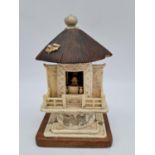 An Early 19th Century Chinese Religious Shrine. Hand-carved in ivory. 18cm tall, 11cm width. As