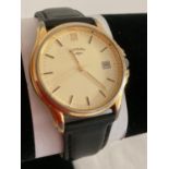 Gentlemans ROTARY WRISTWATCH quartz model in gold tone with black leather strap having sweeping