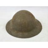 WW1 1st Pattern British Raw Edge Brodie Helmet. One of the lugs has had a period field repair, but