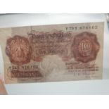 An O'Brien Bank of England Late Run Ten Shilling Note. Y79Y 876102. Uncirculated - In a plastic